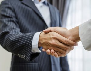 handshake op de beurs